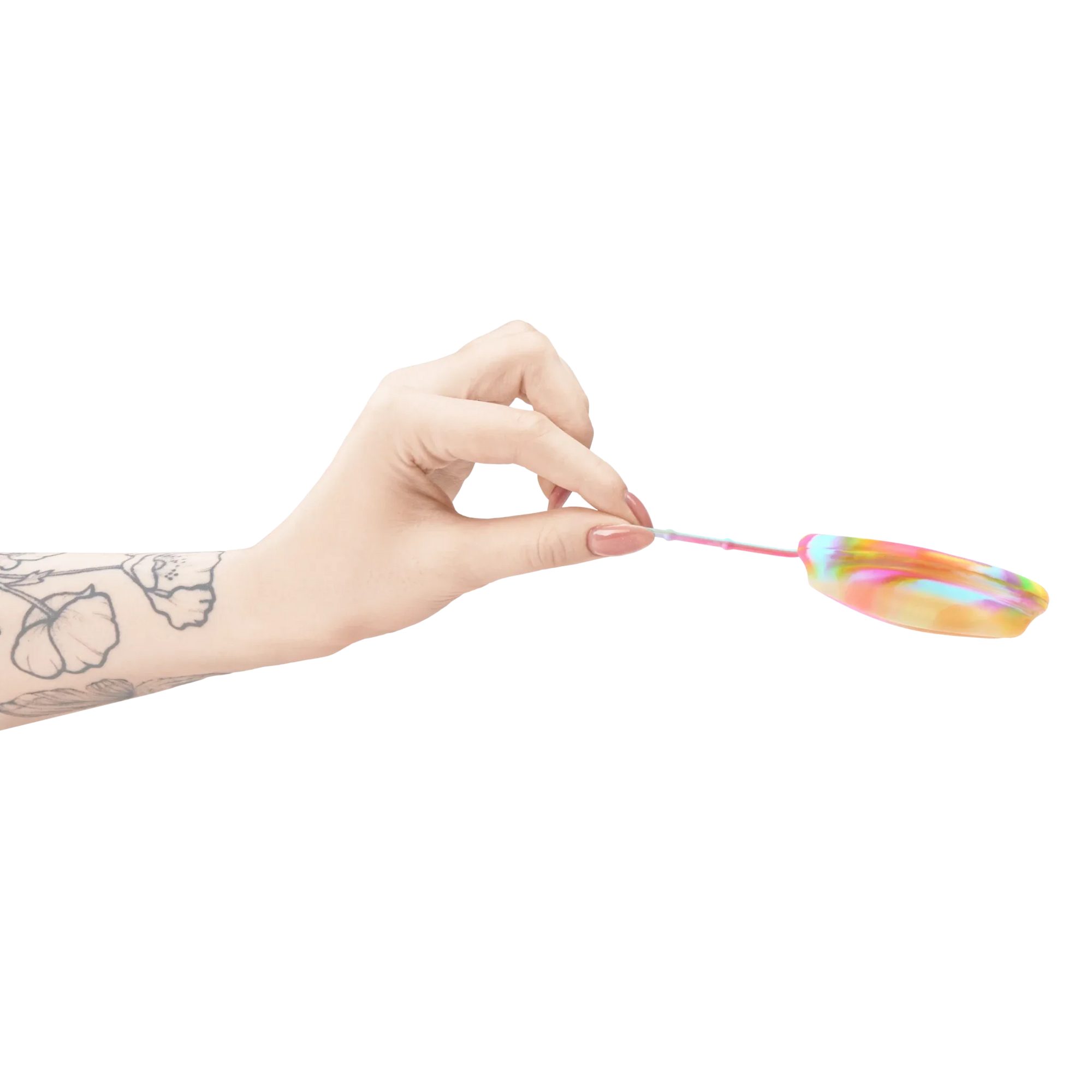 Hand holding a Bodyotics Comfydisc Rainbow Edition reusable menstrual disc with pull-off string, showcasing rainbow colors and body-safe silicone design.