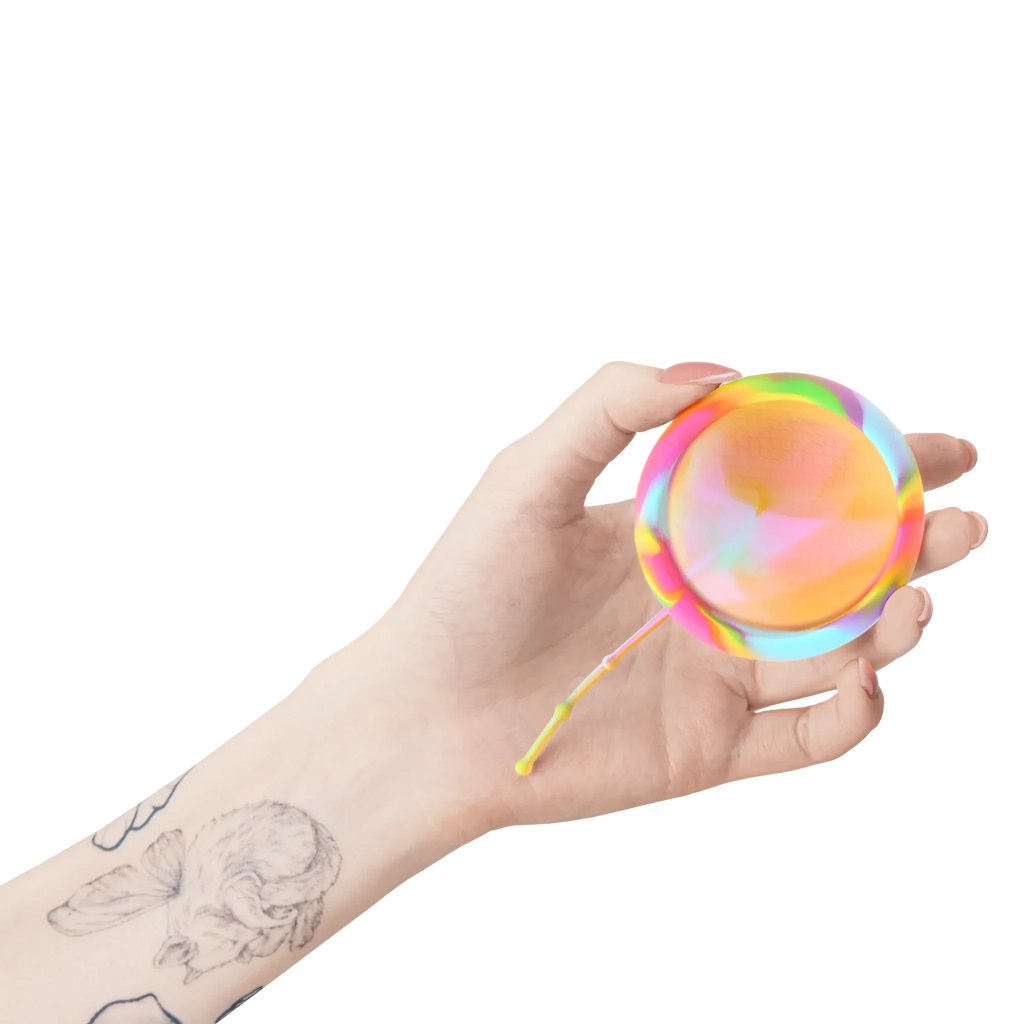 Hand holding Bodyotics Comfydisc Rainbow Edition reusable menstrual disc with pull-off string, colorful silicone design